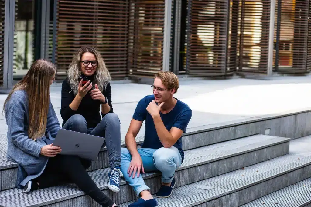 photo of international students chatting outside university